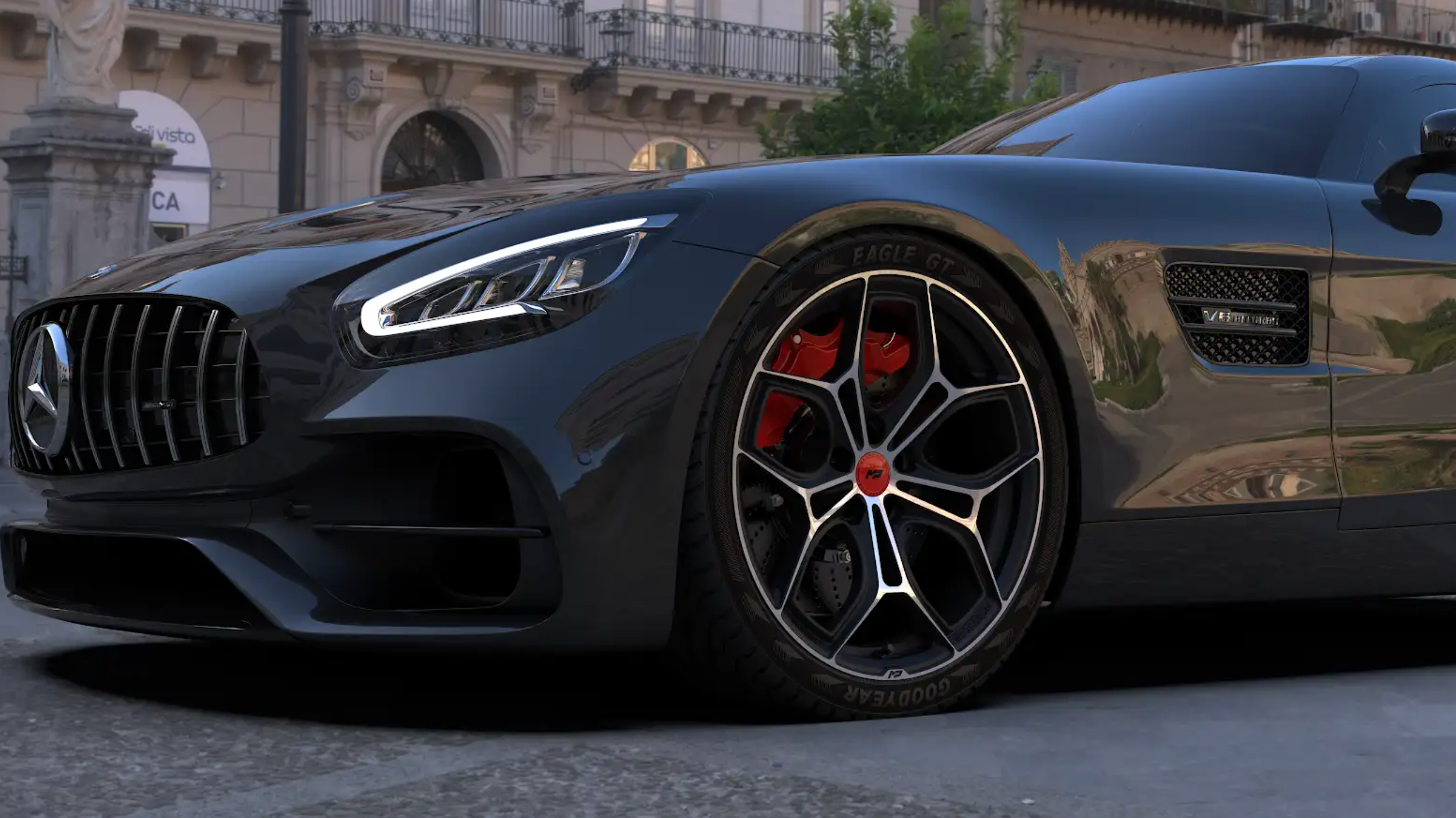 Close-up of a black Mercedes-AMG sports car with MP forged wheels parked on a city street.