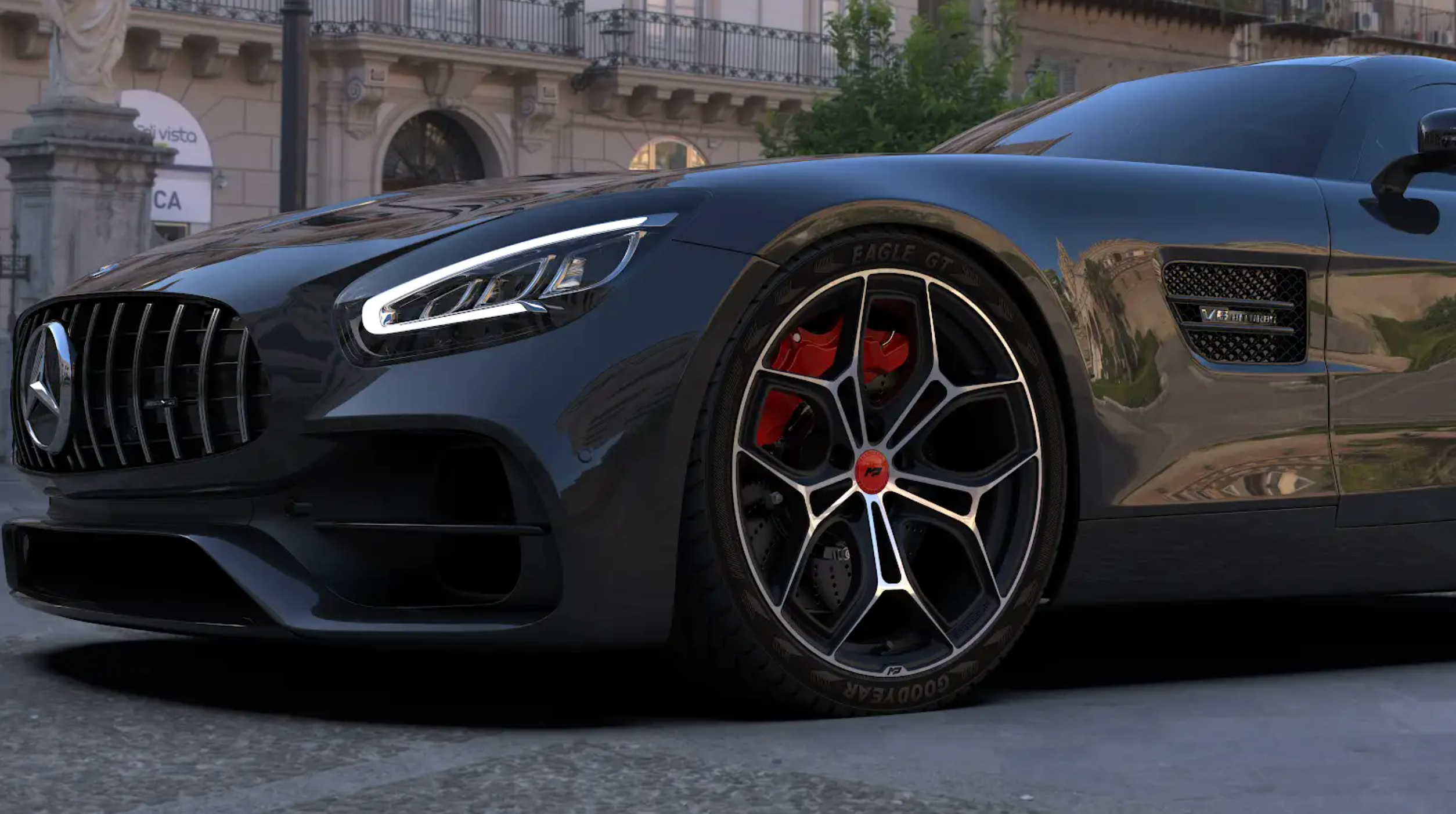Close-up of a black Mercedes-AMG sports car with MP forged wheels parked on a city street.